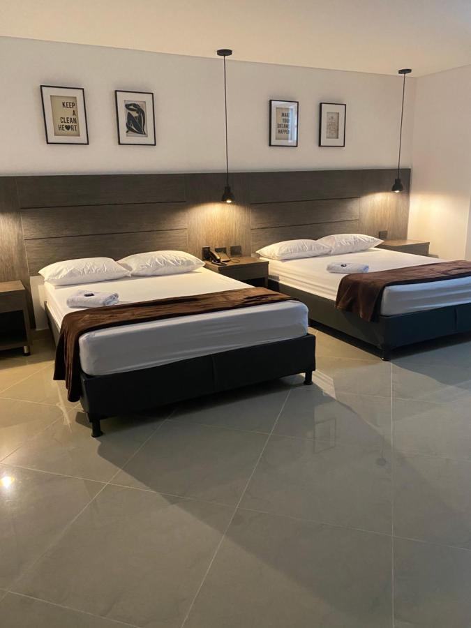 Hotel California City Меделин Екстериор снимка